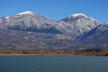 Fototapeta premium lake Lungo, Poggio Bustone and massif of Terminillo