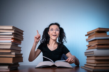 young girl reading very interesting book at home