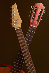 Electric and classical acoustic guitar fretboards