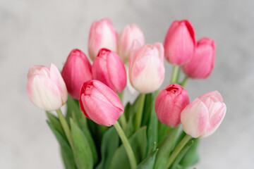 A bouquet of delicate pink tulips for the holiday. Mother's day, birthday, valentine's day. tender greeting card. soft selective focus.