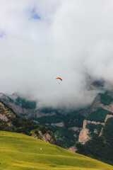 Fototapeta premium Paragliding flights. Chegem. Republic of Kabardino-Balkaria. Caucasus.