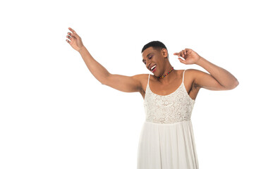 happy african american man in sundress dancing with closed eyes isolated on white
