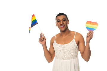 happy african american transsexual man holding lgbt flag and paper heart in rainbow colors isolated...