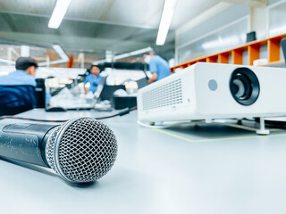 close-up microphone and projector on table in the meeting room.