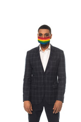 african american businessman wearing lgbt colors safety mask isolated on white