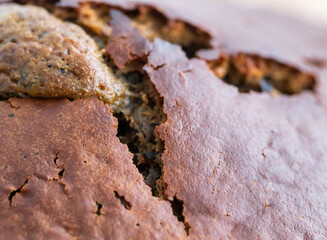 Unsuccessful baking gingerbread with raw filling, background. Macro, products
