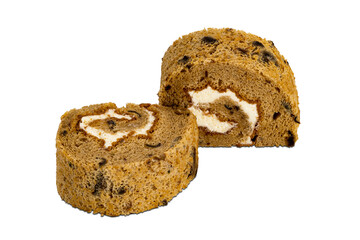 Side view of prune sponge cake roll isolated on white background.