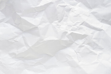White crumpled paper texture background.