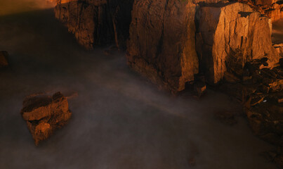 Time-lapse photography of the rocks on the beach