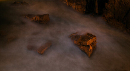 Time-lapse photography of the rocks on the beach