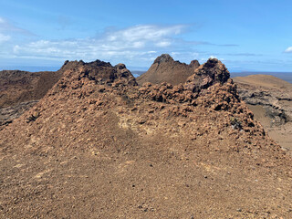 Both new and old geological formations in the Galapagos Islands. Rock formations that are present at sea level and also inside the island, such as lava tunnels. They are relatively new rocks, speaking