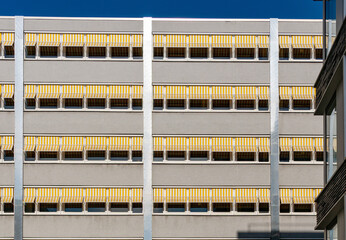 abandoned office building or office complex with cool looking sunblinds.