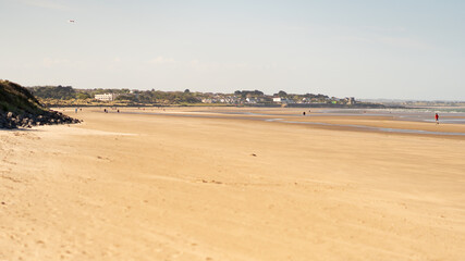 Panoramic view of Portmarnock beach, County Dublin, Ireland. Vivid colors, Copy space for text holiday background.