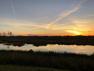 reflections of sunset in the river