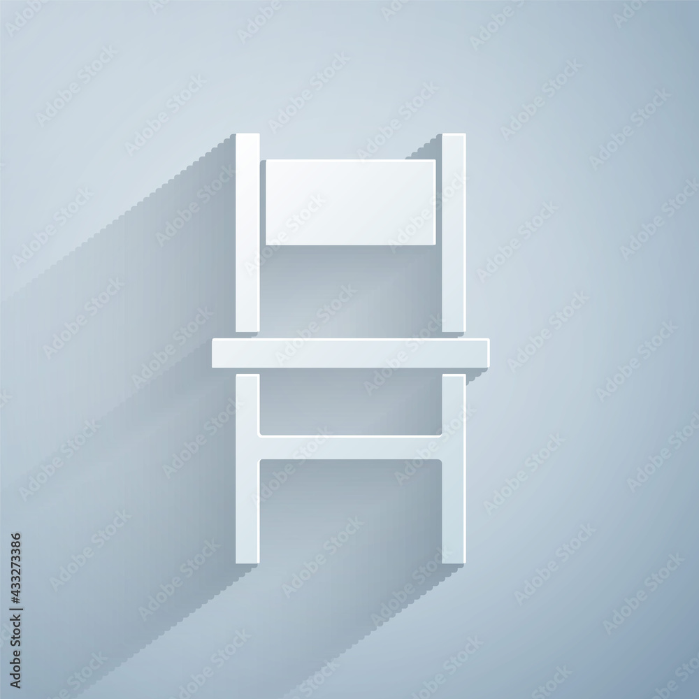 Sticker paper cut chair icon isolated on grey background. paper art style. vector