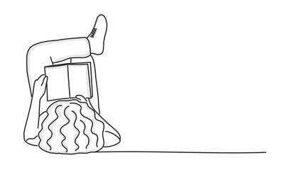 Girl is laying on the floor reading book.