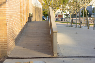 Access ramp to a building for handicapped persons