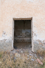 access door to a ruined farmhouse
