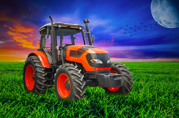 Fototapeta premium Agricultural tractor on the background of a colorful landscape