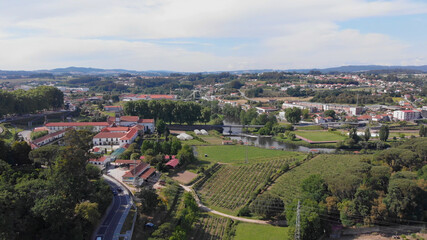 Fototapeta na wymiar DRONE AERIAL VIEW - The Monastery of St. Benedict (Sao Bento) in the city of Santo Tirso, Portugal, with the Ave River in the background. Benedictine order.