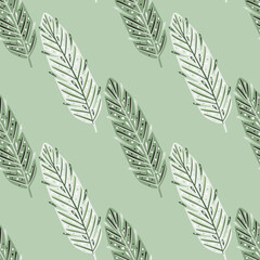 Feather seamless doodle pattern in vintage style. Bohemian style. Green pastel background. Ornamental style.