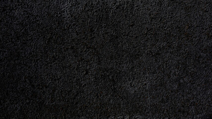 Fototapeta premium Dark rough plaster texture background image