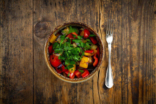 Grilled eggplant and pepper with parsley leaves