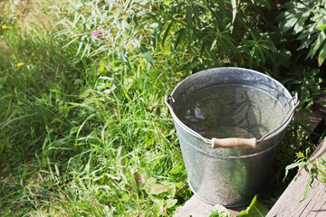 Metal  bucket with the pure water