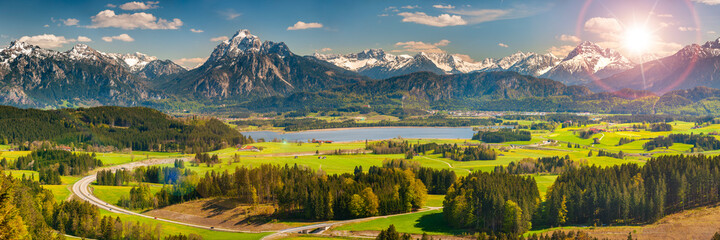 panoramic landscape with alps mountain range at springtime
