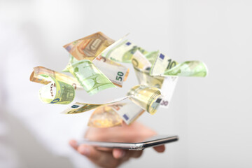 banking euro banknote in hand rain