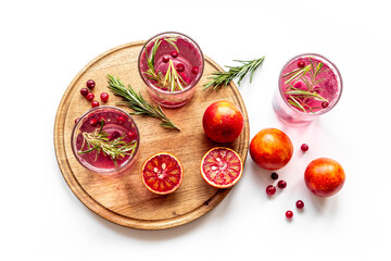 Red oranges refrashing drink lemonade with cranberry. Top view