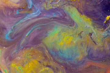 Fototapeta na wymiar Multicolored paints create a beautiful abstract background.