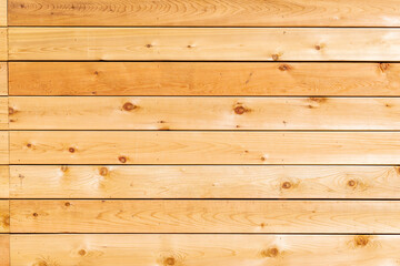 Obraz premium Fresh wood softwood wall made of horizontal boards.