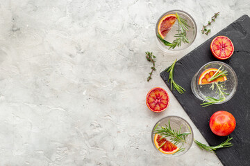 Summer cocktails with blood orange grapefruit and ice. Top view