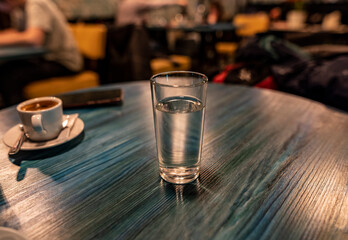 still life with food and drinks on a table in a restaurant 