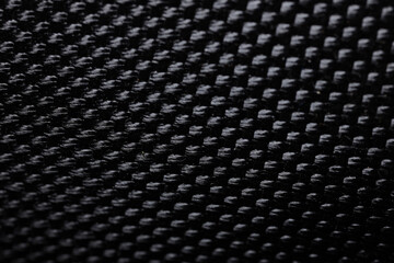 Black nylon fabric texture background. Macro photography 