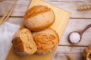 Top view on fresh baked whole grain loaves of bread
