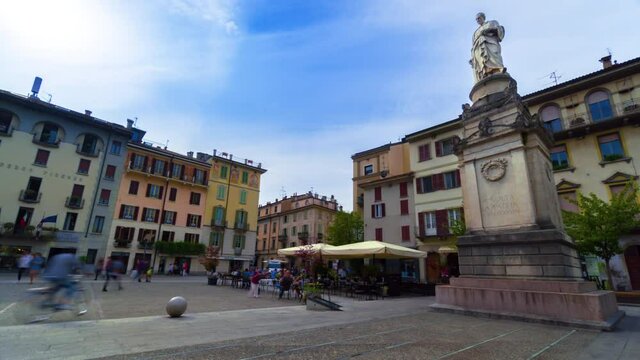 City of Como.time lapse.The statue of the inventor Alessandro Volta,stands in the middle of the lovely square.
Tourists visit the beautiful city of Como overlooking Como lake.