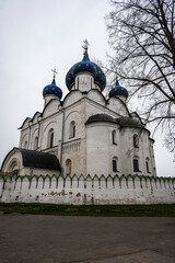 city views of the old kremlin churches and the monastery of the city of Suzdal during the rain