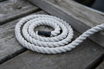 A perfect circle of white old rope. Sailing and Maritime concept.