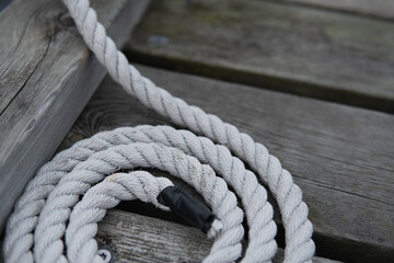 A perfect circle of white old rope. Sailing and Maritime concept.