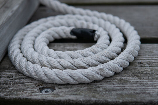 A perfect circle of white old rope. Sailing and Maritime concept.