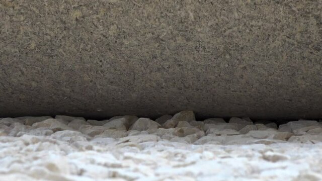 Road Construction. Compactor roller at asphalting work. Close up