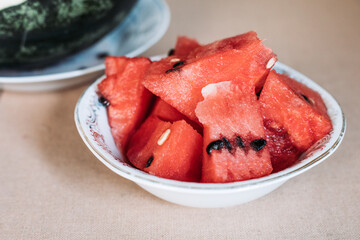 Bowl with slices of watermelon. Healthy summertime diet