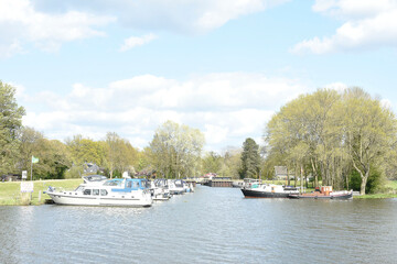 Fototapeta na wymiar Marina with motor boats near Laag Keppel in river Oude IJssel