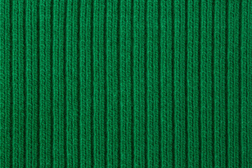 Knitted texture green close up, background