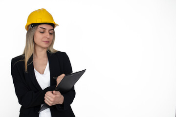 meeting and notes. job and profession concept. engineer or architect woman in yellow helmet.
