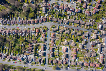 Straight down aerial photo of the British town of Meanwood in Leeds West Yorkshire showing typical UK housing estates and rows of houses in the spring time on a sunny day