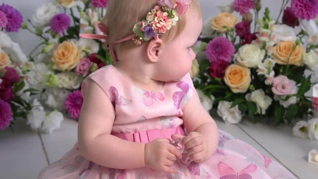 Slow Motion Baby girl at pink dress