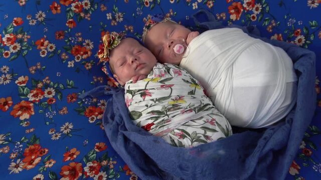 Slow Motion Six day old fraternal, twin, newborn